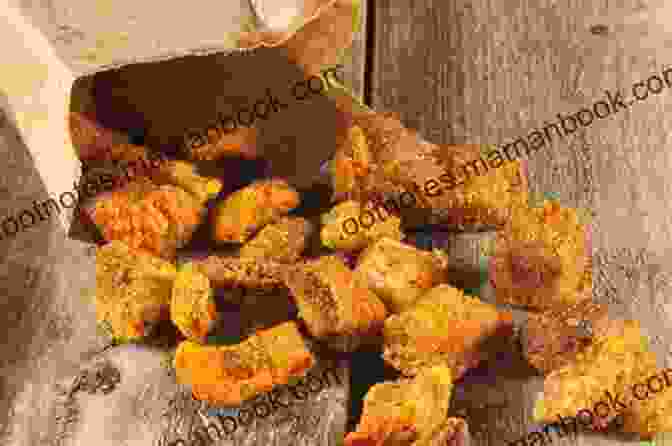 A Bowl Of Cracklins, A Crispy Cajun Snack Made From Fried Pork Skin. Mouthwatering Cajun Recipes That Are Not Only Etouffee And Jambalaya : The Best Cajun Cookbook For Beginners And Pro Chefs