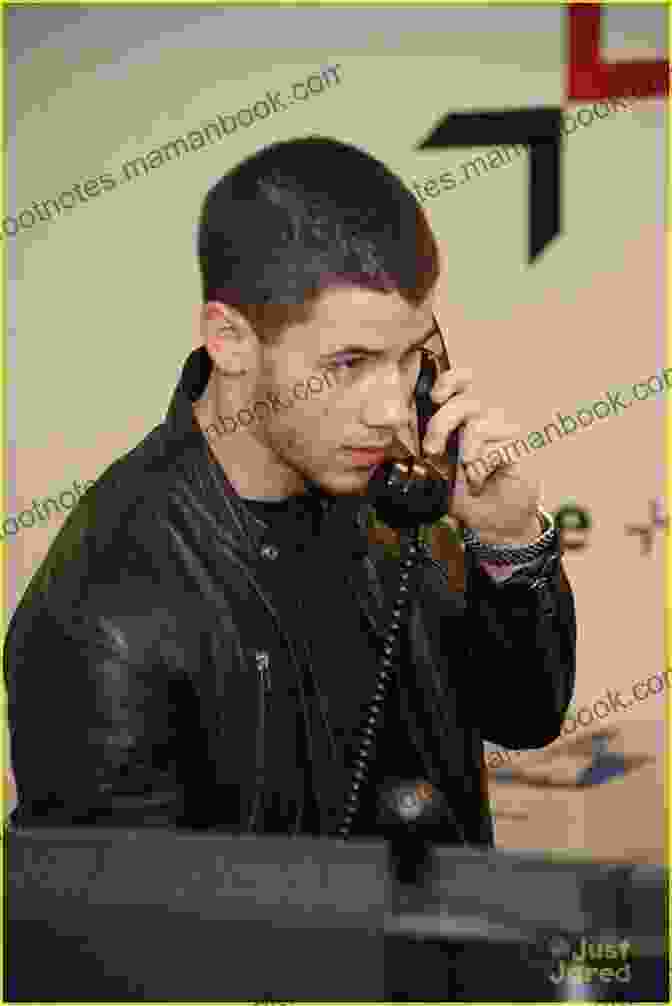 Nick Jonas At A Charity Event Nick Jonas: A Life Between Shadow And Limelight